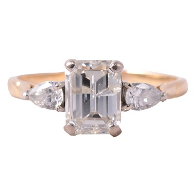 Lot 72 - A diamond three stone ring.
