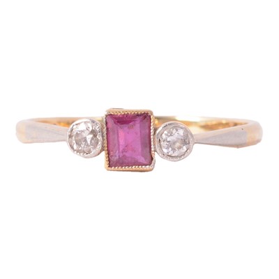 Lot 34 - A ruby and diamond ring.