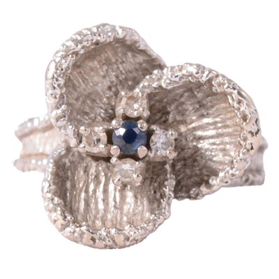Lot 19 - A 1970's white gold ring set with sapphire and diamonds.