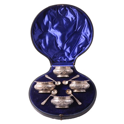 Lot 217 - Matched set of four silver salts with spoons, Walker & Hall, Birmingham 1897 and 1900.