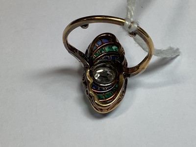 Lot 20 - An Art Deco diamond ring with emerald and sapphire surround.
