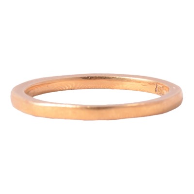 Lot 158 - A 22 carat gold wedding band.