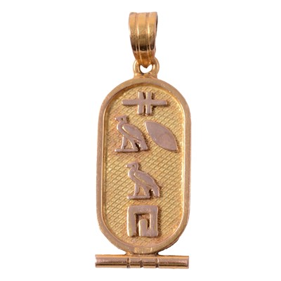 Lot 239 - An Egyptian yellow metal cartouche style pendant.
