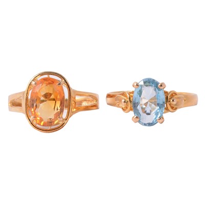 Lot 118 - Two dress rings, citrine and heat treated blue topaz.