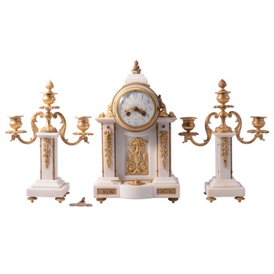 Lot 127 - Louis XVI style white marble and gilt metal three-piece clock garniture