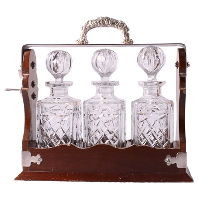 Lot 135 - Three bottle tantalus