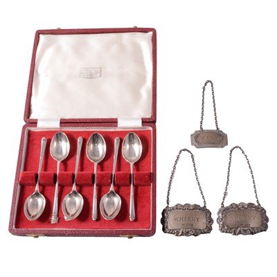 Lot 275 - Set of six silver teaspoons and three silver decanter labels