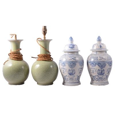 Lot 50 - Pair of Chinese celadon glazed vases, adapted to table lamps, and a pair of modern covered jars