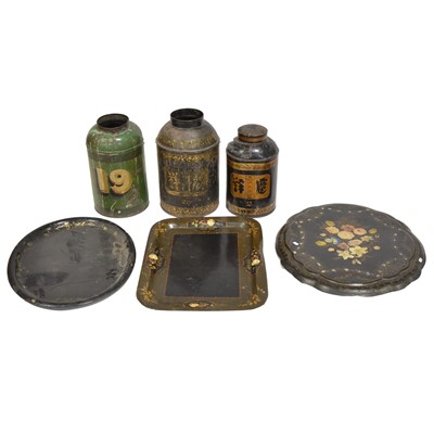 Lot 149 - Three Toleware tea canisters, two Toleware trays, and a papier-mache table top