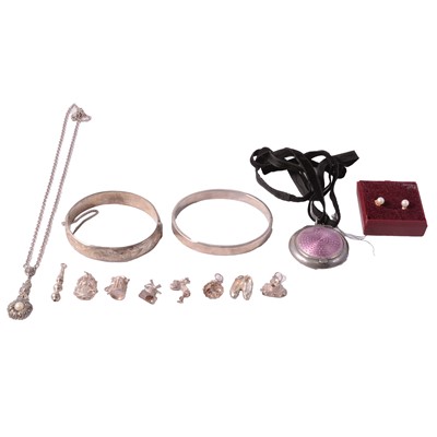 Lot 488 - Two silver half hinged bangles, an enamelled patch box, cultured pearl earstuds, marcasite pendant.