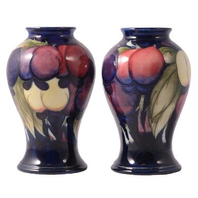 Lot 85 - Moorcroft Pottery, a pair of 'Wisteria' pattern vases, circa 1920s