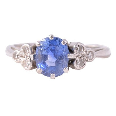 Lot 2 - A sapphire and diamond ring.