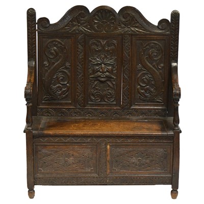 Lot 504 - Carved oak settle