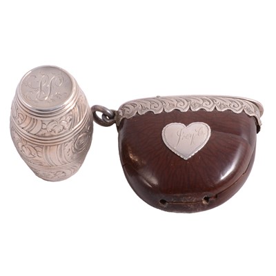 Lot 100 - Georgian silver barrel nutmeg grater and a white metal mounted nut vesta