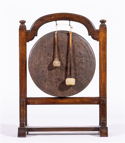 Lot 384 - Oak framed floor-standing gong, the frame with...