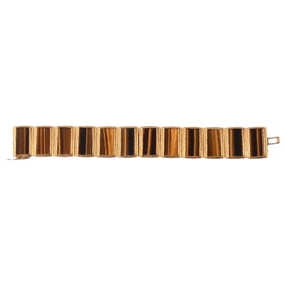 Lot 282 - An early 1970's vintage tiger's eye panel bracelet.