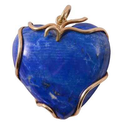 Lot 254 - A lapis lazuli heart shape pendant.