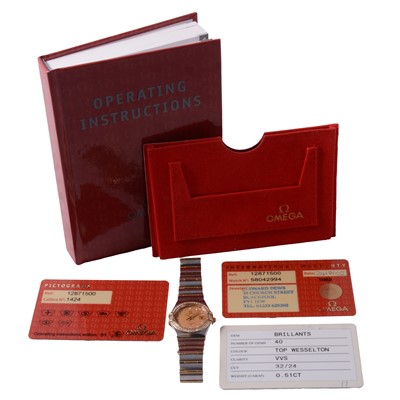 Lot 427 - Omega - a lady's Constellation diamond set two tone stainless steel quartz wristwatch.