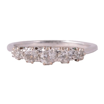 Lot 84 - A diamond five stone ring.