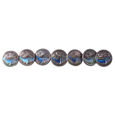 Lot 456 - Liberty & Co Cymric - a set of seven silver and blue / green enamel buttons.
