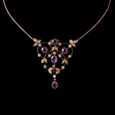 Lot 260 - An Edwardian amethyst and seed pearl necklace.
