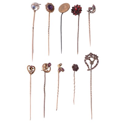 Lot 350 - Ten stick pins, amethyst, ruby and pearl, garnet, and others.