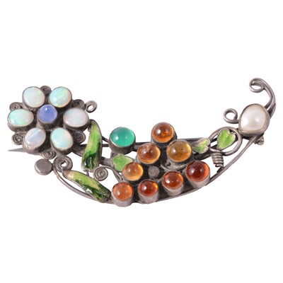 Lot 457 - A gemset brooch in the manner of Dorrie Norrister.