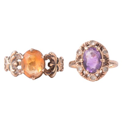 Lot 113 - Two dress rings, amethyst and white stone (not diamond), citrine.