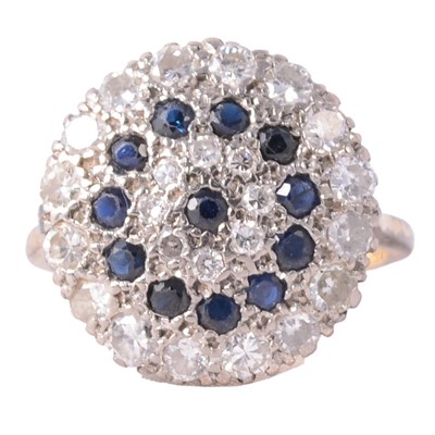Lot 8 - A large sapphire and diamond cluster ring.