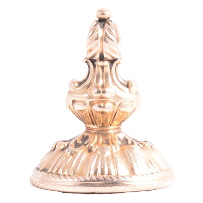 Lot 357 - An antique yellow metal seal with intaglio carved base.