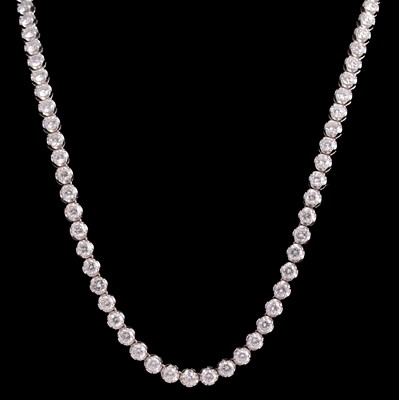 Lot 264 - A diamond riviere necklace.