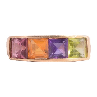 Lot 120 - A gemstone half hoop ring.