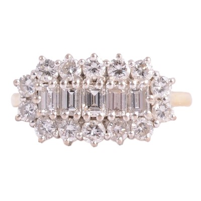 Lot 94 - A wide diamond cluster ring.