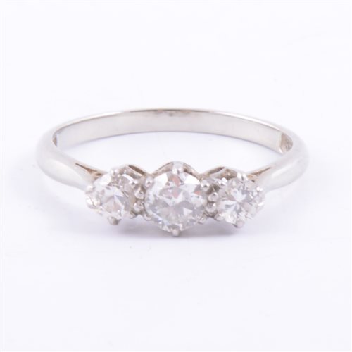 Lot 169 - A diamond three stone ring, the brilliant cut...