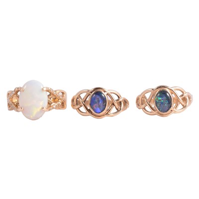 Lot 51 - Three opal rings.