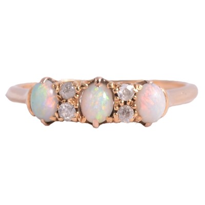 Lot 55 - An opal and diamond half hoop ring.