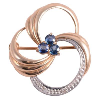 Lot 213 - A sapphire and diamond brooch.