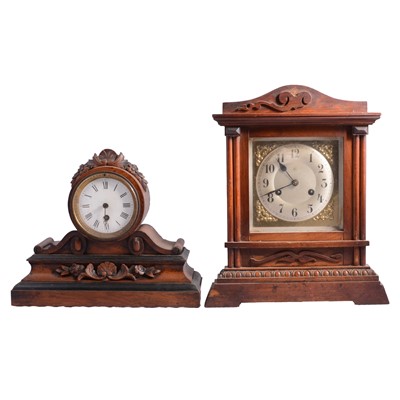 Lot 121 - Two walnut cased mantel clocks