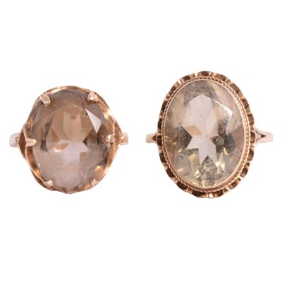 Lot 116 - Two gemset dress rings, citrine, smoky quartz.