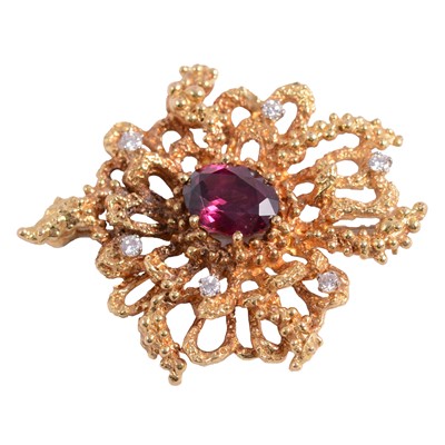 Lot 206A - An 18 carat yellow gold brooch set with garnet and diamonds.