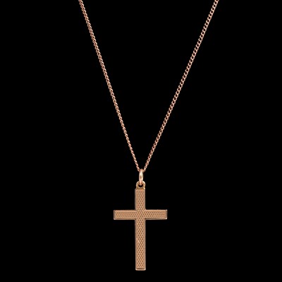 Lot 234A - A yellow metal cross on a chain.
