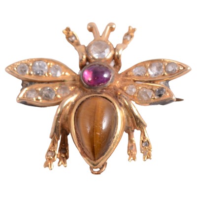 Lot 194A - A diamond, tiger's eye, and pink stone bug brooch.