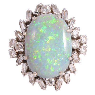 Lot 48A - A large black opal and diamond cluster ring.