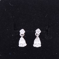 Lot 183 - A pair of diamond earrings, a pear shaped...