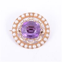 Lot 192 - An amethyst and pearl brooch, the cushion...