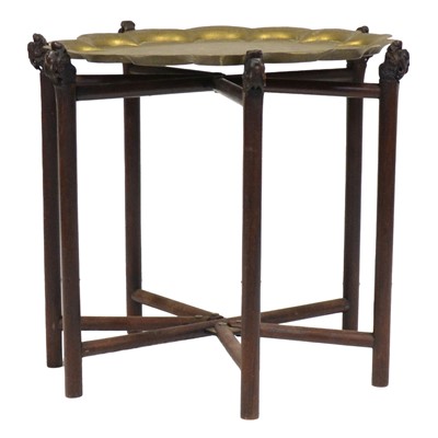 Lot 87 - Indian brass tray, on a carved rosewood Chinese folding stand