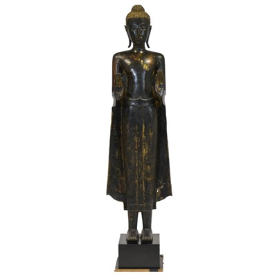 Lot 75 - A monumental Thai bronze and lacquered figure of Shakyamuni Buddha, Ayutthaya period