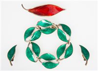 Lot 206 - David Anderson of Norway - a red enamel leaf...
