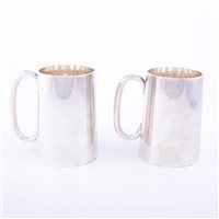 Lot 134 - Two very similar silver one pint presentation...
