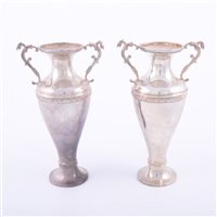 Lot 145 - Pair of Victorian silver vases, William Comyns,...